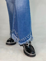 Pantalon de jeans con strass en la bota