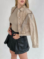 Chaqueta corta beige de flecos